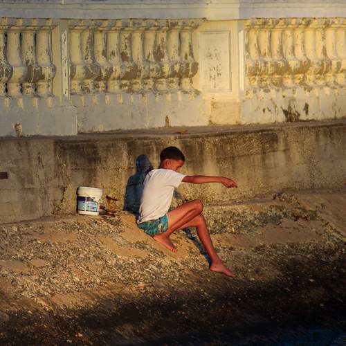 Boy Fishing Alone