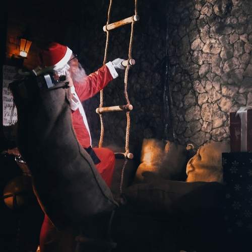 Santa Claus climbs a rope ladder