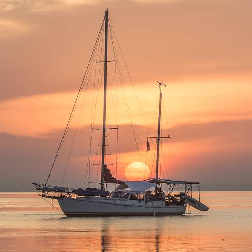 Sailboat With Beautiful Sunrise