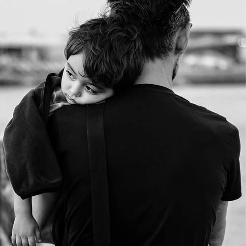 Tender moment between father and child