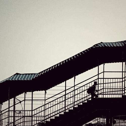 Pedestrian Silhouette — Zigzag Covered Walkway, Sikar at Afternoon Backlight