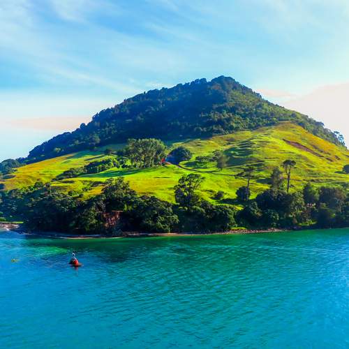 Tranquil Green Island in Blue Waters