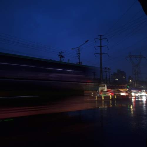 Between wires and wheels, life flows.