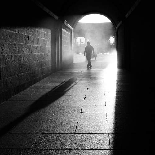 A man walking in the light