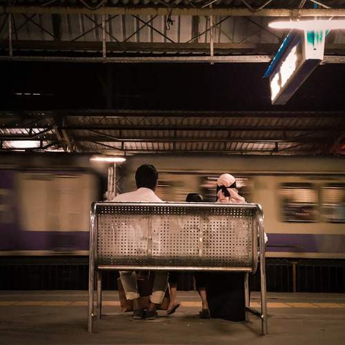 Waiting as the World Rushes By