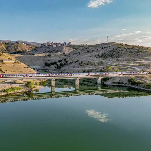Train Crossing the Silent River