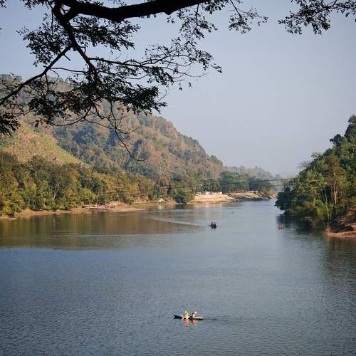 Mountain, river & boat - I think there\'s a natural connection among them.