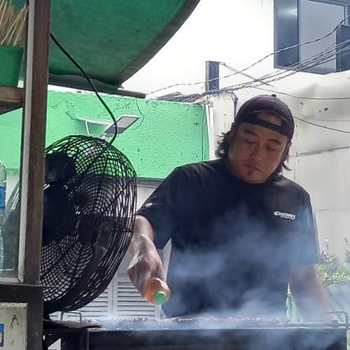 Chicken and goat satay seller