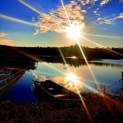 Lagoa com pôr do sol ☀️