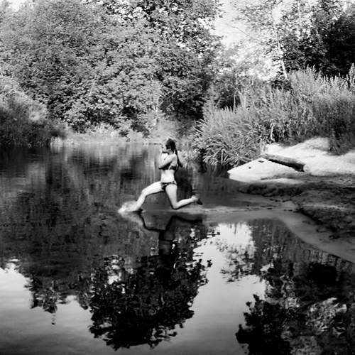 Running on the surface of the water.