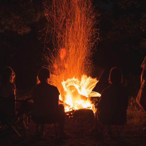 A sheaf of sparks and bright tongues of flame.