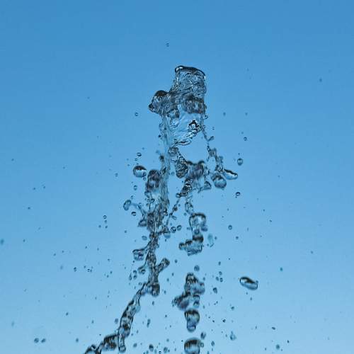 The moment when a jet of water disintegrates in the air