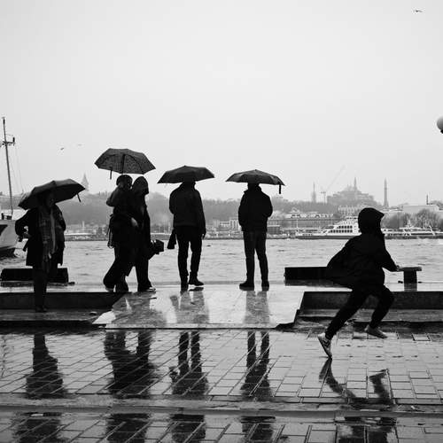 Child is run in the rain