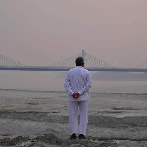 Lonely man in the river