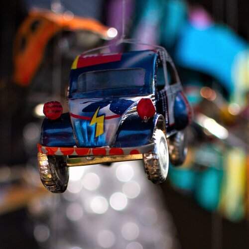 The Little Flying Beetle in the Night Market