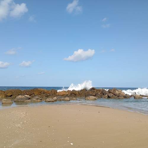 Clouds and sky, splashes in the sea.