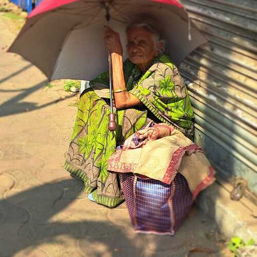The lady with the red umbrell