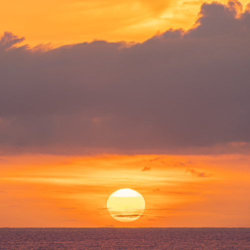 Amber Glow Over the Caribbean Horizon