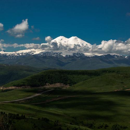 В облаках.