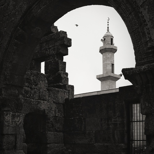 Witnesses of Time: Between Church Ruins and Minaret