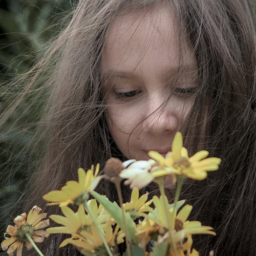 Children\'s portrait with autumn flowers