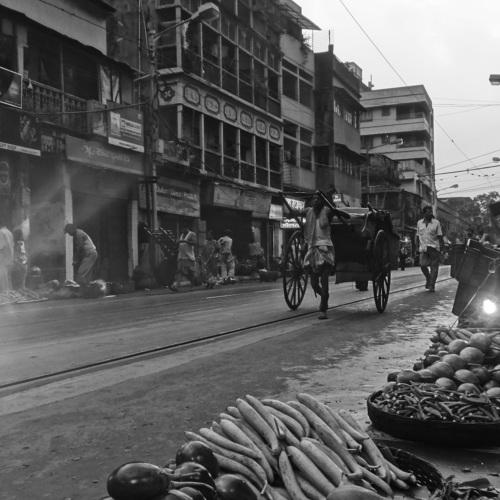Hand puller rickshaw of British Raj in B & W.