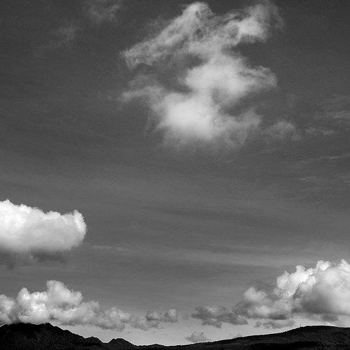 Two clouds above the mountain