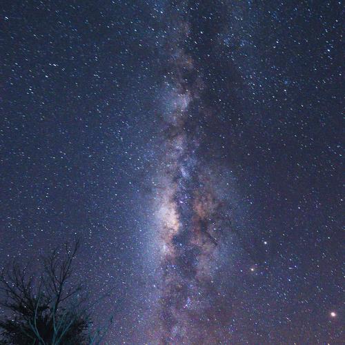 Damaged Houses Under The Milky Way