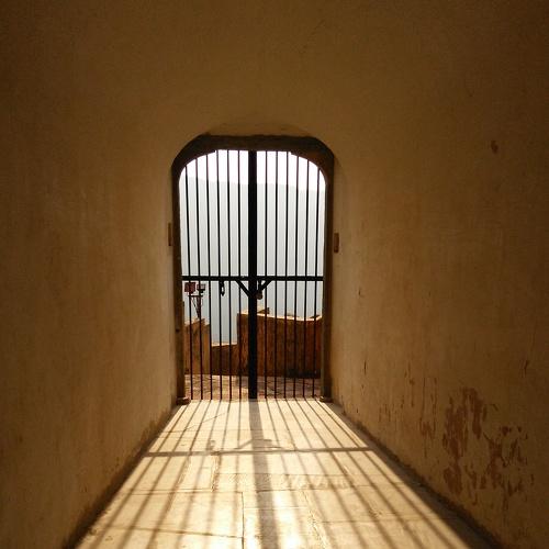 sun rays through the bars