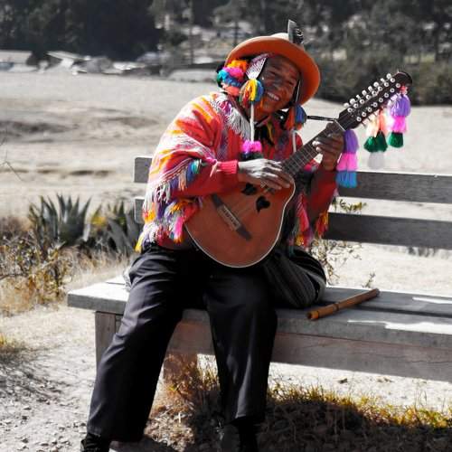 Cheerful Guitarist in Cusco