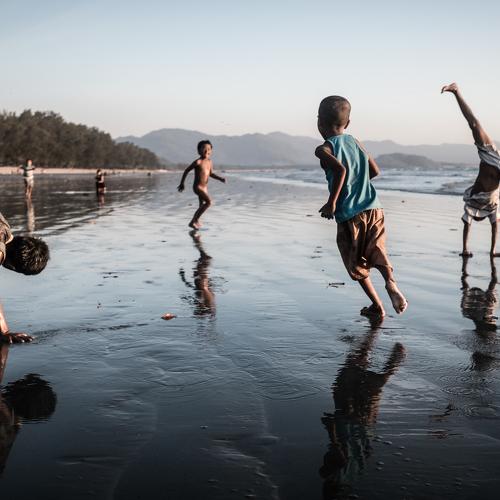 Kids playing at Dawei beach, Myanmar