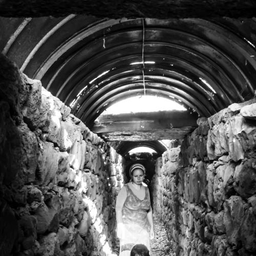 Madonna in ruinned bunker. Life is continue!