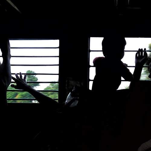 "playing with the shadows while travelling in general coach"