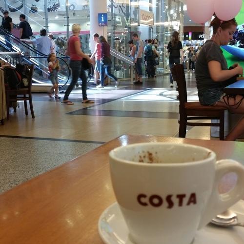 The cup of coffee.