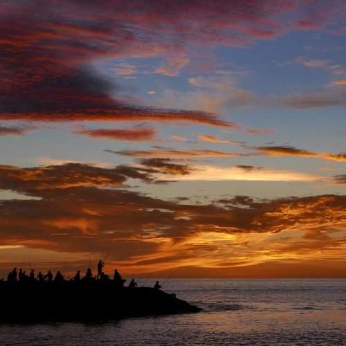 Sunset and the fisherman