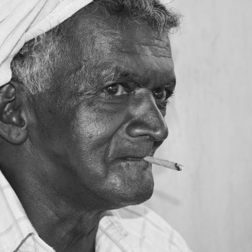 Old man own its own style smoke