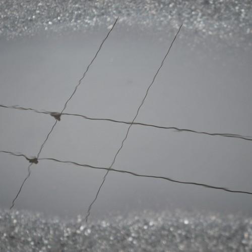 Trolleybus wires in a puddle
