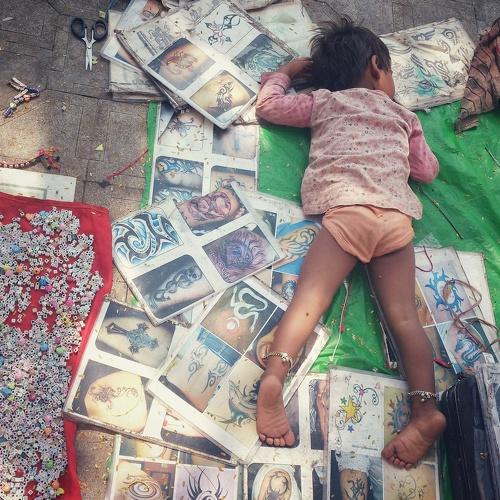 Sleeping child in the street