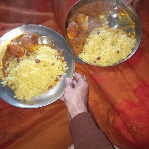 The egg curry with rice.