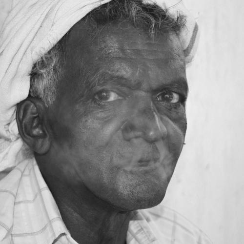 Old farmer  and  his own style smoke