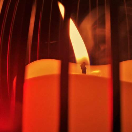 Only a candle can both defy and define darkness