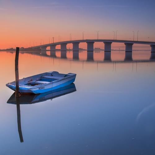 blue boat @ sunrise