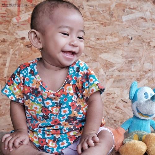 Smile with doll