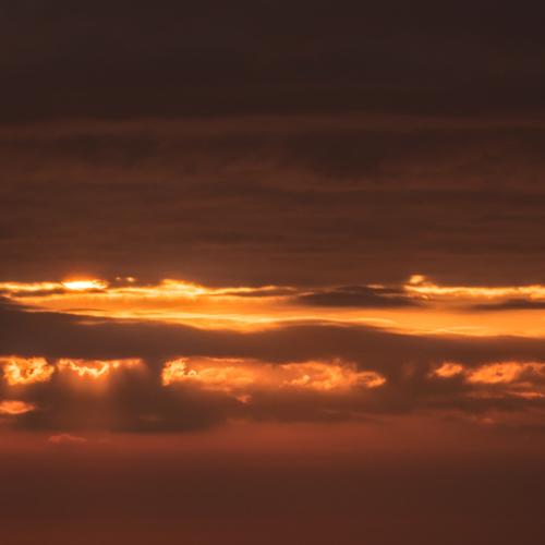 SUNRISE IN THE CLOUDS