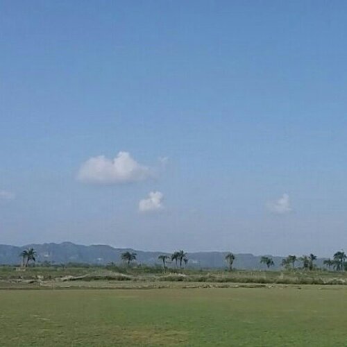 Middle of beach and mountain side