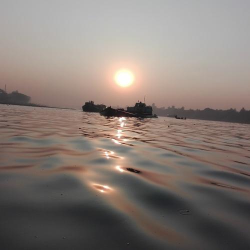 Sun Rises Over River
