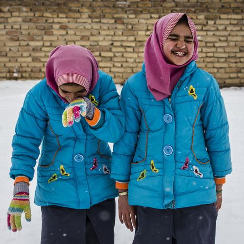 smiley twins in the snow