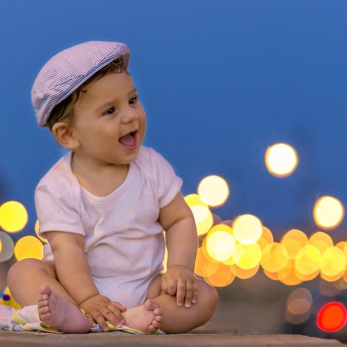 Cute little baby and night lights