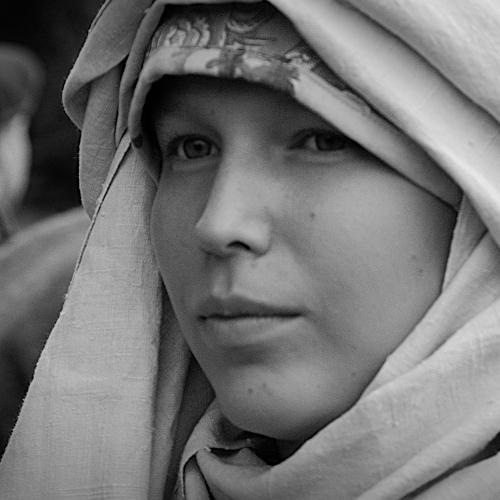 Young girl in a white scarf