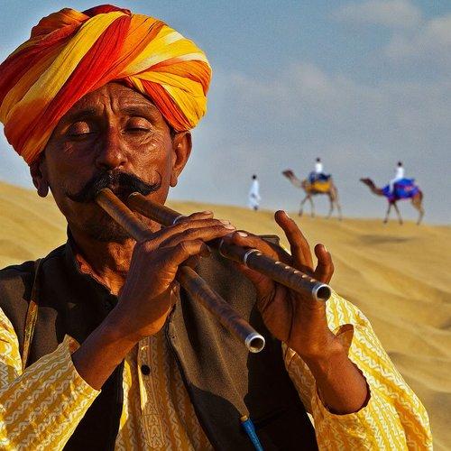 Flutist Of Sam Sand Dunes